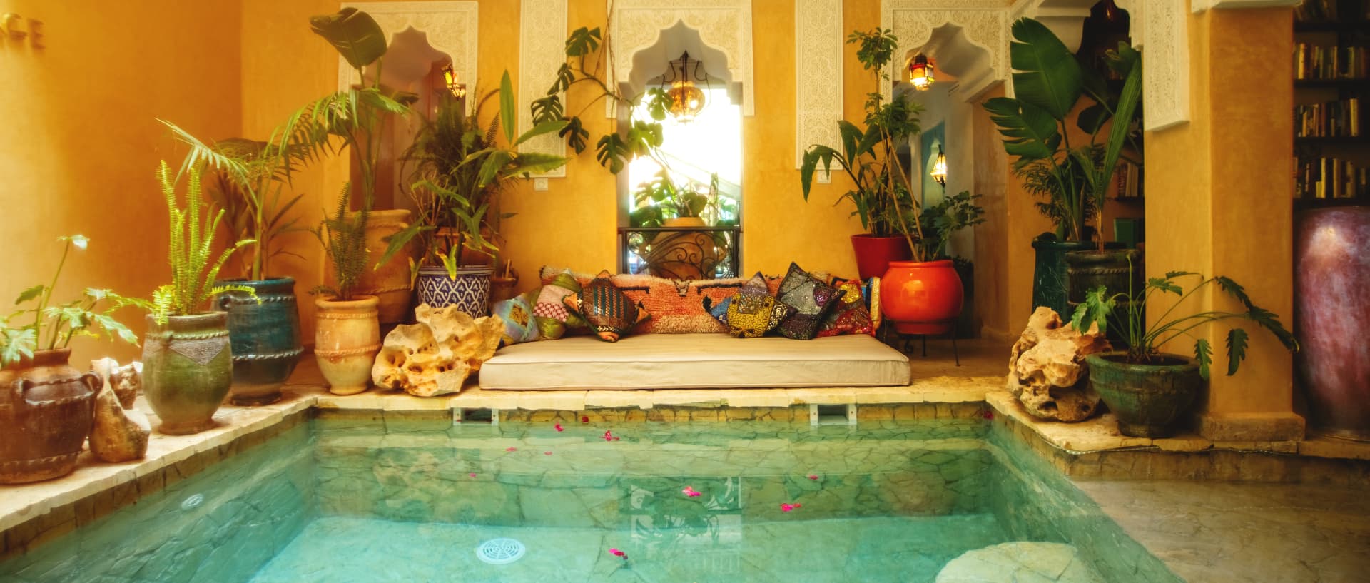 The sunlit courtyard pool at Riad Persephone